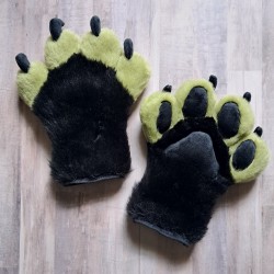 Green and black handpaws